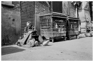 A waste management company has developed a device to help protect homeless people who seek shelter inside industrial bins from harm.