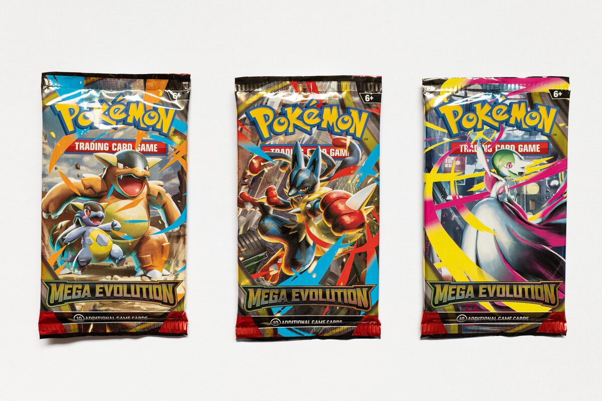 Pokemon sealed booster packs featuring Mega Evolution trio