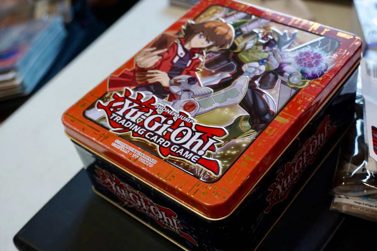Yu-Gi-Oh sealed collector tins stacked together