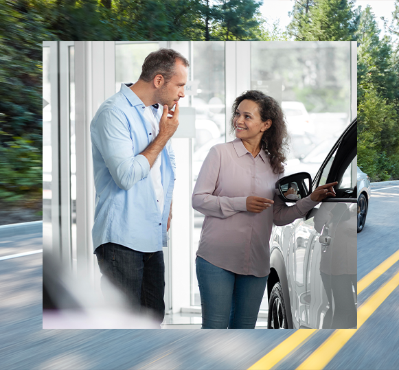 How to Prepare to Trade in Your Car |  CMA's Toyota of Martinsburg in Martinsburg, WV | Man and woman checking out a new car at a dealership