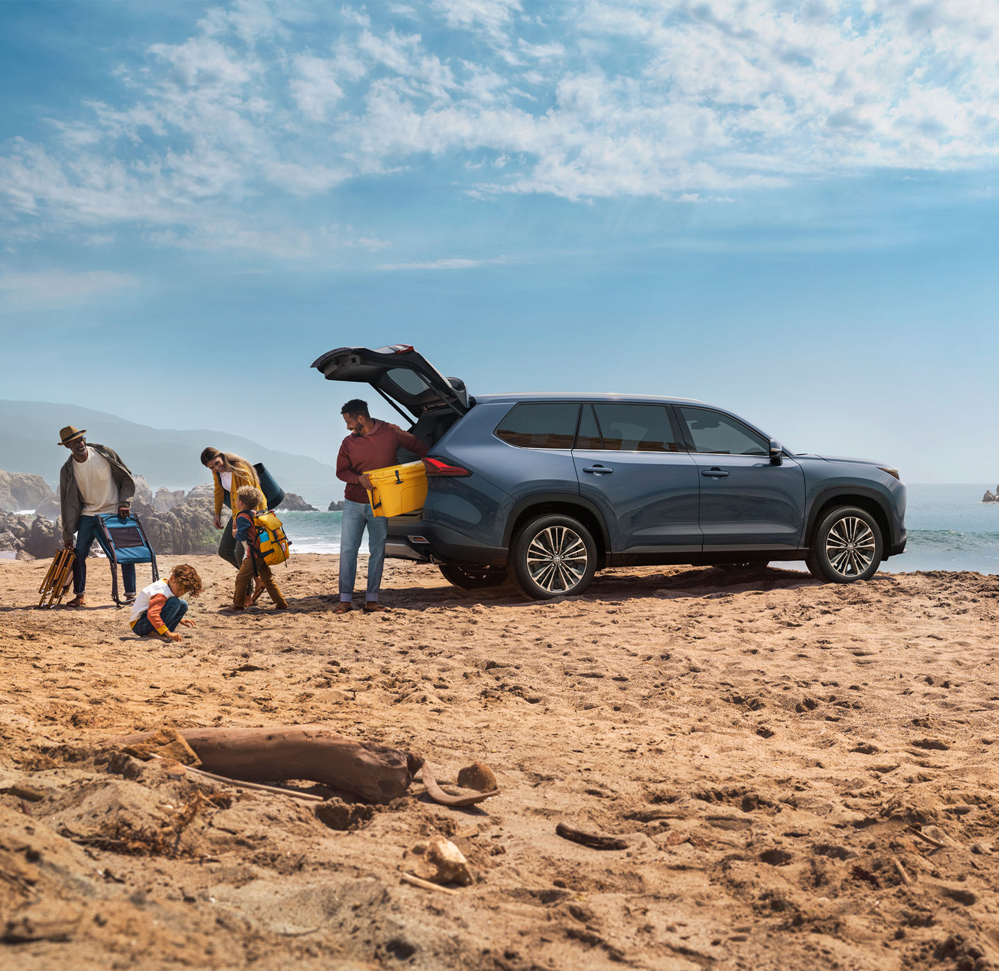 2025 Toyota Grand Highlander vs 2025 Subaru Ascent comparison | Bobby Rahal Toyota | family unpacking car of a 2025 Toyota Grand Highlander