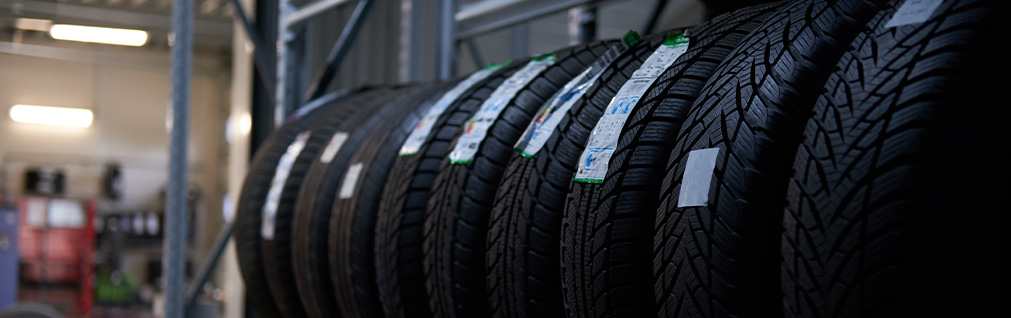 What different tire options are available at CMA's Toyota of Martinsburg | Row of different new tire options on a rack
