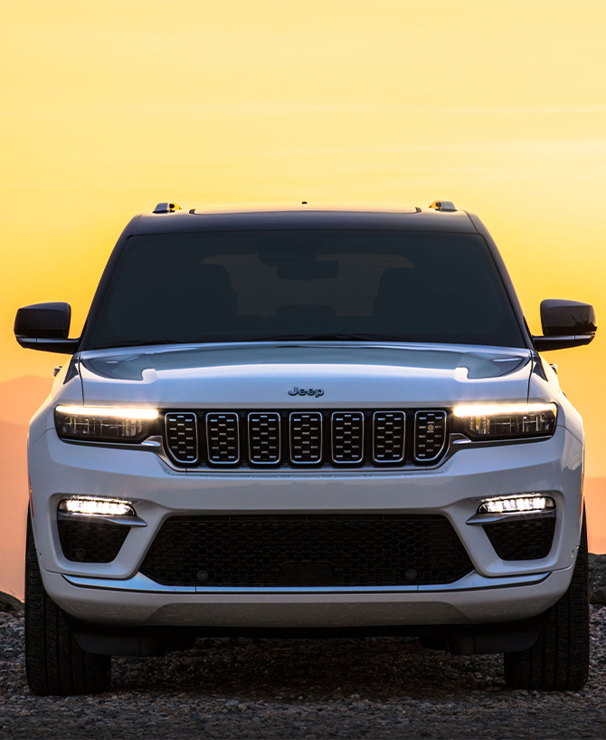 2025 Jeep Grand Cherokee at Delaney CDJR of DuBois | Front grill of a white 2025 Jeep Grand Cherokee