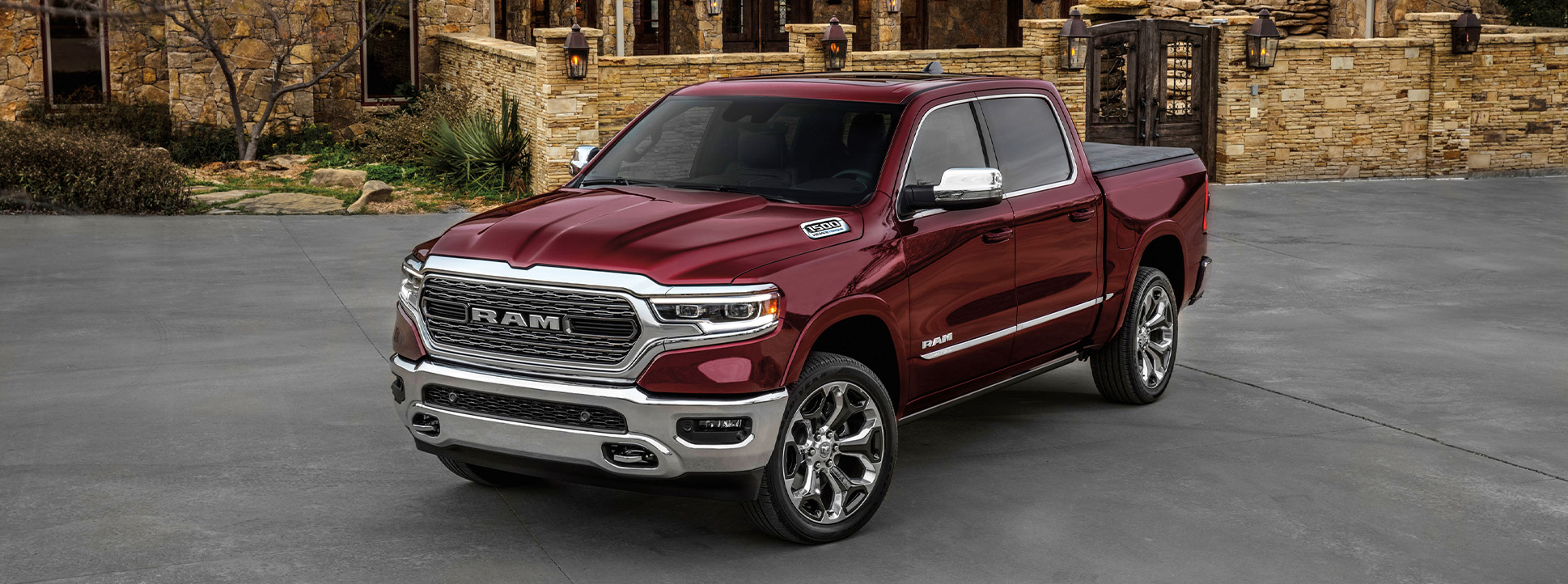 2025 Ram 1500 at Delaney CDJR of DuBois | Burgundy color 2025 RAM 1500 parked in driveway