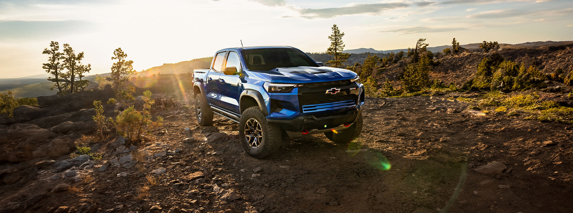 2026 Chevrolet Colorado at Delaney Chevrolet of Greensburg | Blue 2026 Chevrolet Colorado parked on top of a hill 2026 Chevrolet Colorado at Delaney Chevrolet of Greensburg | Blue 2026 Chevrolet Colorado parked on top of a hill