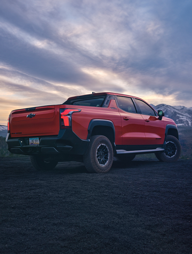The 2025 Chevrolet Silverado 1500 at Delaney Chevrolet of Indiana | Rear profile of a red 2025 Chevy Silverado 1500 Trail Boss