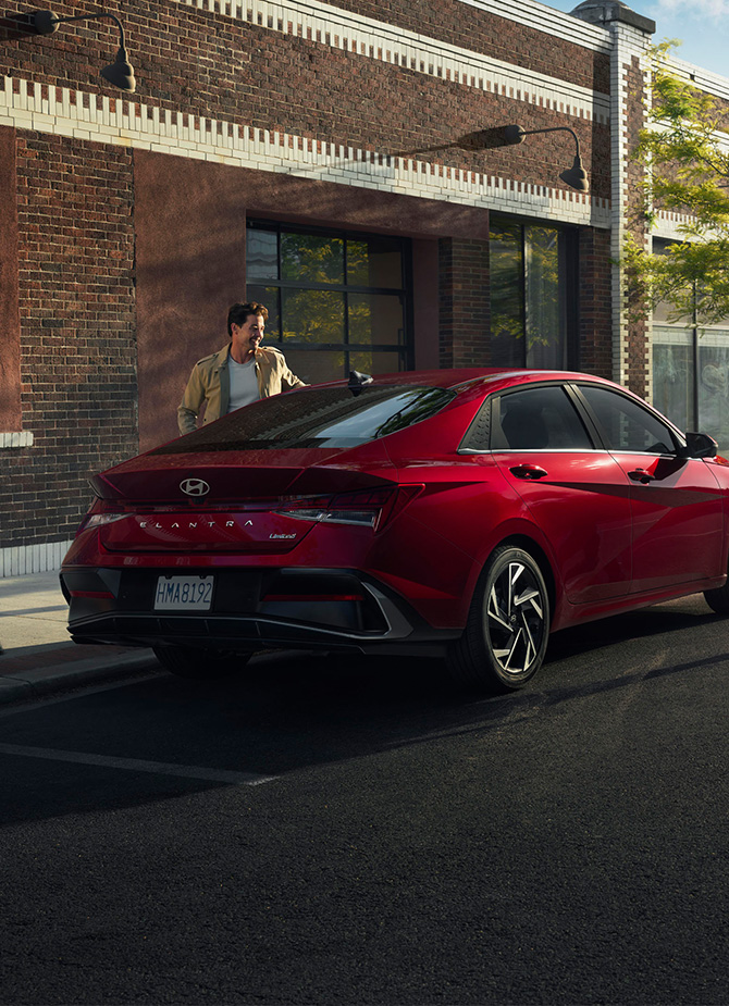2025 Hyundai Elantra at Delaney Hyundai of Dubois | Rear profile of a parked 2025 Hyundai Elantra in the color red
