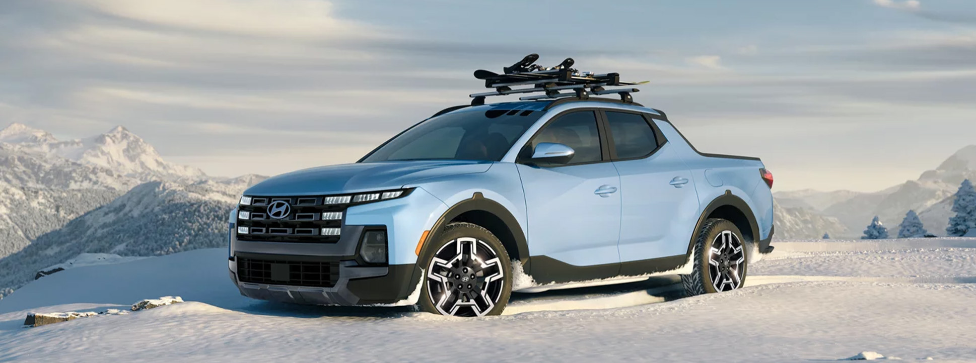 2025 Hyundai Santa Cruz at Delaney Hyundai of Dubois | Light blue 2025 Hyundai Santa Cruz parked in the middle of the snow