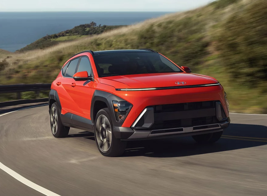  2026 Hyundai Kona at Delaney Hyundai of Dubois | 2026 Kona driving up the hill at a high speed