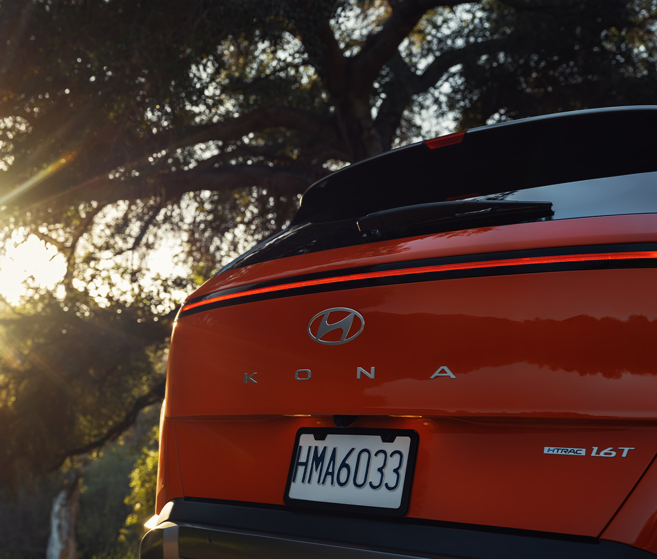 2025 Hyundai Kona at Delaney Hyundai of Indiana | Rear View of Orange 2025 Hyundai Kona