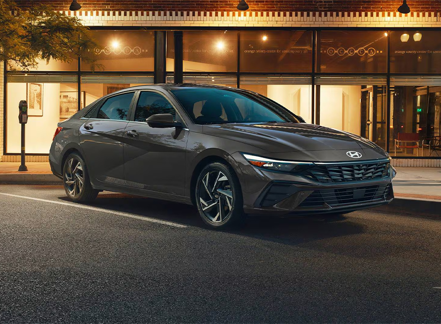  2026 Hyundai Elantra at Delaney Hyundai of Indiana | 2026 Hyundai Elantra parked in front of restaurant
