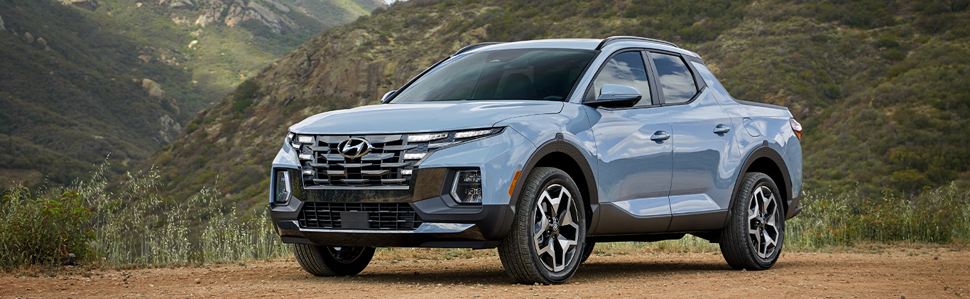  2026 Hyundai Santa Cruz at Delaney Hyundai of Indiana | Blue 2026 Hyundai Santa Cruz parked outside on top of a hill