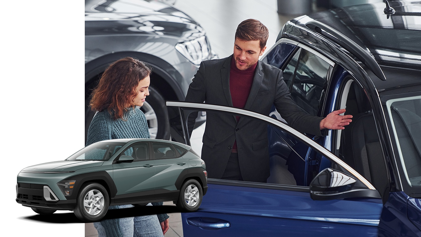 Best Time To Buy At Delaney Hyundai of Indiana in Indiana, PA | Sales person opening the passenger side door for customer / Side profile of a 2024 Hyundai Kona in the color green 