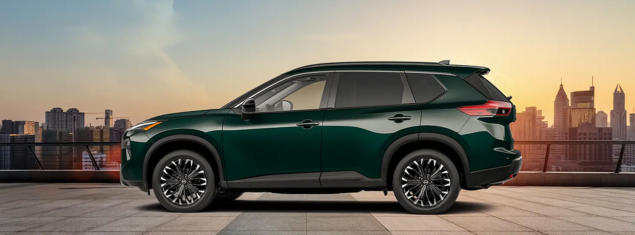 2026 Nissan Rogue at Delaney Nissan of Greensburg | Side profile of a 2026 Nissan Rogue in the color green 2026 Nissan Rogue at Delaney Nissan of Greensburg | Side profile of a 2026 Nissan Rogue in the color green