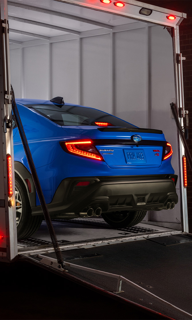 2025 Subaru WRX at Delaney Subaru in Indiana, PA | Rear profile of a 2025 Subaru WRX parked inside of a trailer
