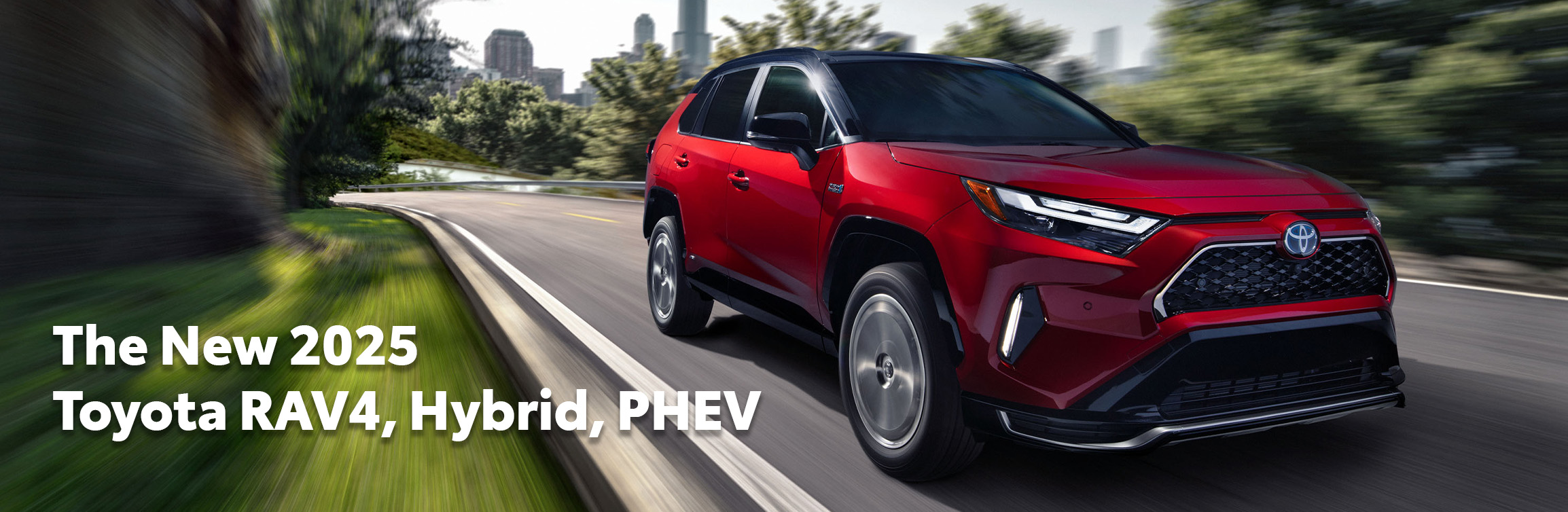 2025 Toyota RAV4, Hybrid, PHEV at Delaney Toyota of DuBois in DuBois, PA | 2025 red RAV4 driving down a empty road at high speeds