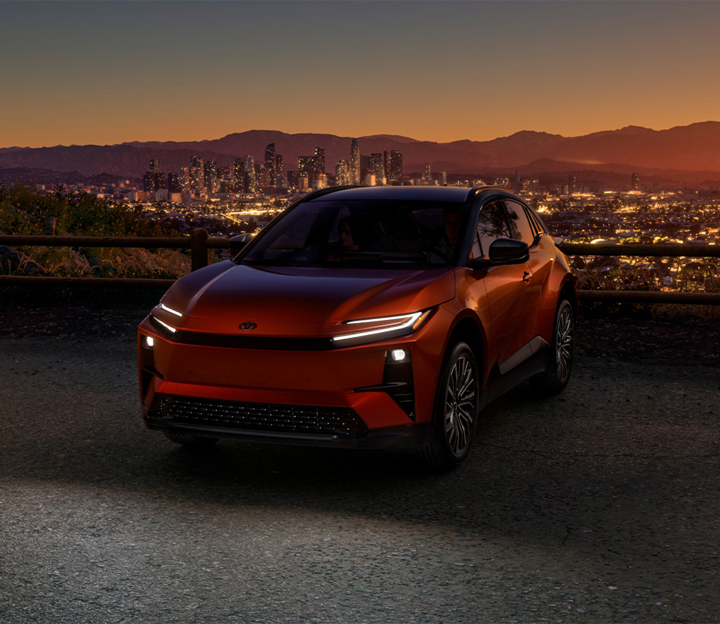 2026 Toyota CH-R at Delaney Toyota of DuBois in DuBois, PA | front profile of a orange 2026 Toyota CH-R with head lights on 2026 Toyota CH-R at Delaney Toyota of DuBois in DuBois, PA | front profile of a orange 2026 Toyota CH-R with head lights on