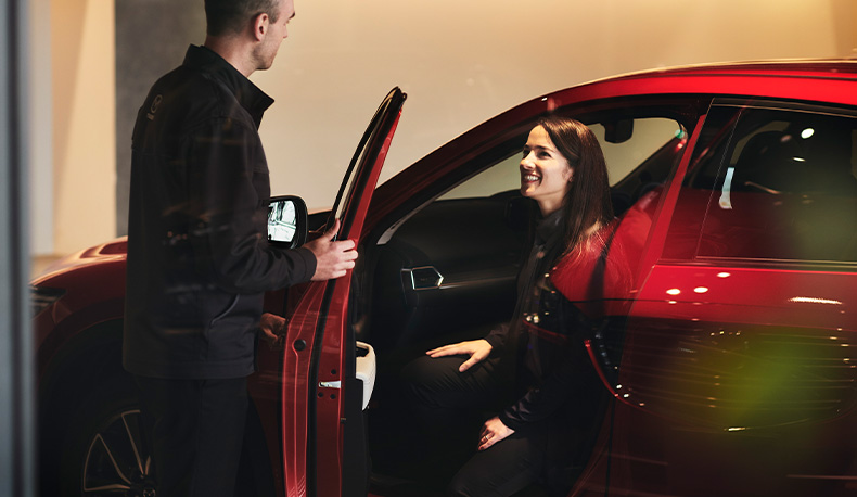 The Advantages of Buying a Car from a Dealership vs. a Private Seller. Learn more at Lancaster Mazda in East Petersburg, PA | Sales person holding car door for customer sitting in a new red 2025 Mazda The Advantages of Buying a Car from a Dealership vs. a Private Seller. Learn more at Lancaster Mazda in East Petersburg, PA | Sales person holding car door for customer sitting in a new red 2025 Mazda