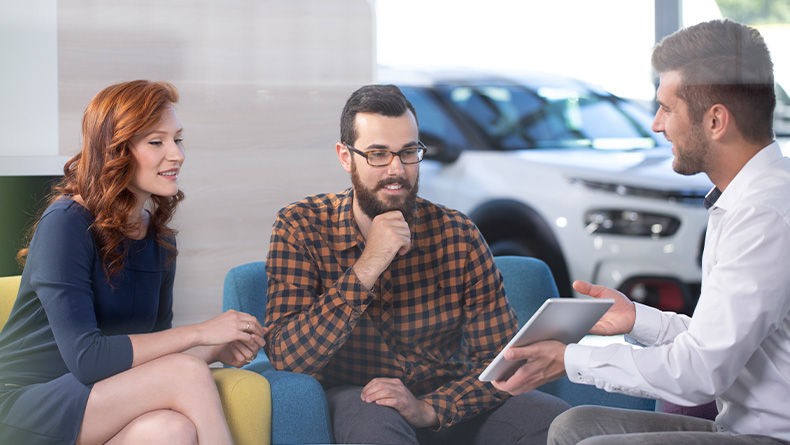 The Advantages of Buying a Car from a Dealership vs. a Private Seller. Learn more at Lancaster Toyota in East Petersburg, PA | Sales person holding a touch screen while showing some customers the documentation needed for buying a new car The Advantages of Buying a Car from a Dealership vs. a Private Seller. Learn more at Lancaster Toyota in East Petersburg, PA | Sales person holding a touch screen while showing some customers the documentation needed for buying a new car