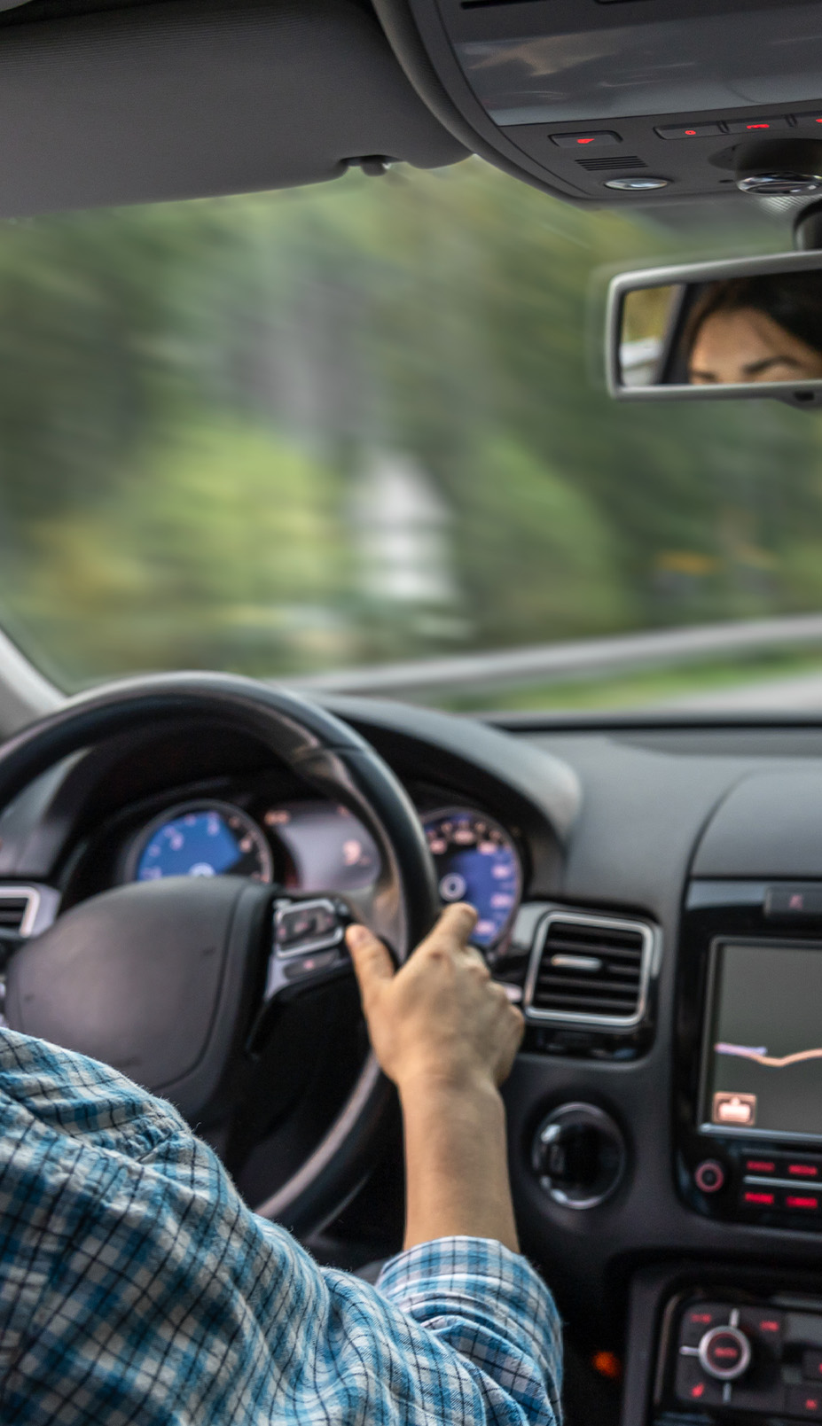 Vehicle Warranty Information at Lancaster Toyota in East Petersburg, PA | Person with their hands on the steering wheel while driving down the street