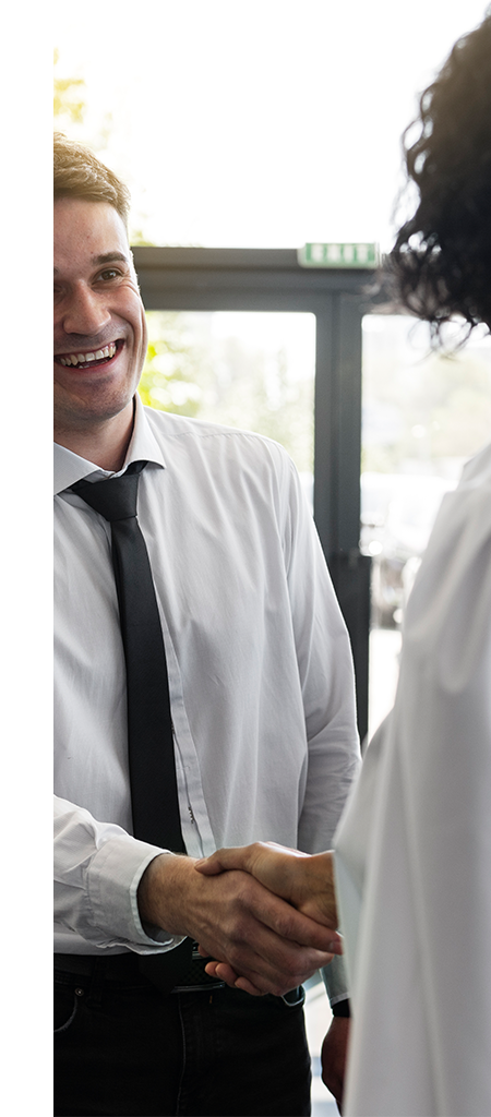 Defining APR at Palmiero Toyota in Meadville, PA | Sales person shaking hands with customer  
