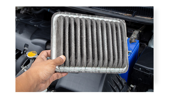 Why Your Car’s Air Filter Matters at Stetler DCJR | Person holding a dirty air filter