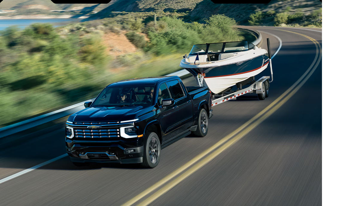2027 Chevrolet Silverado 1500 coming soon to Delaney Chevrolet of Greensburg in Greensburg, PA | Black 2027 Chevrolet Silverado towing a boat down the road 2027 Chevrolet Silverado 1500 coming soon to Delaney Chevrolet of Greensburg in Greensburg, PA | Black 2027 Chevrolet Silverado towing a boat down the road