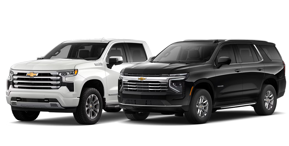 3.0L Duramax Turbo-Diesel engine available at Delaney Chevrolet of Greensburg in Greensburg, PA | White 2026 Chevrolet Silverado and black 2026 Chevrolet Tahoe 3.0L Duramax Turbo-Diesel engine available at Delaney Chevrolet of Greensburg in Greensburg, PA | White 2026 Chevrolet Silverado and black 2026 Chevrolet Tahoe