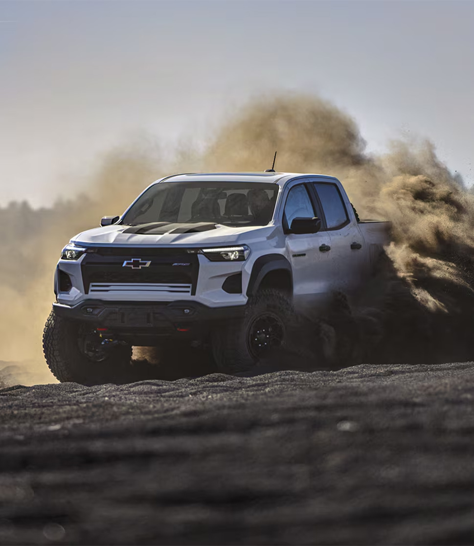 2026 Chevrolet Colorado at Delaney Chevrolet of Indiana | Silver 2026 Chevrolet Colorado driving in the dirt 2026 Chevrolet Colorado at Delaney Chevrolet of Indiana | Silver 2026 Chevrolet Colorado driving in the dirt