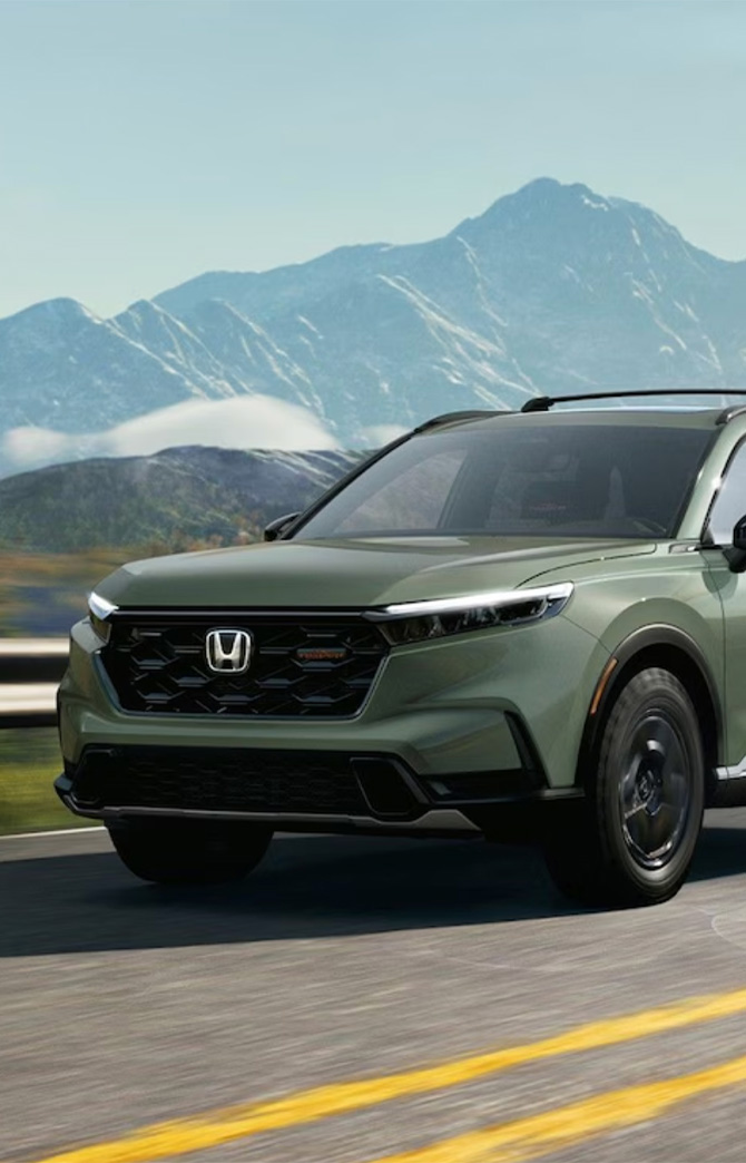 New 2026 Honda CR-V at Delaney Honda | Front Profile of a green 2026 Honda CR-V New 2026 Honda CR-V at Delaney Honda | Front Profile of a green 2026 Honda CR-V