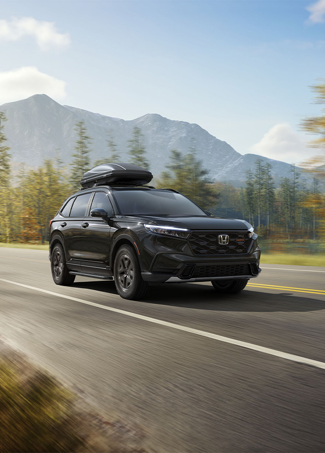 2026 Honda CR-V vs. 2026 Toyota RAV4 vs. 2026 Hyundai Tucson | Delaney Honda | Black 2026 Honda CR-V driving down the road 2026 Honda CR-V vs. 2026 Toyota RAV4 vs. 2026 Hyundai Tucson | Delaney Honda | Black 2026 Honda CR-V driving down the road