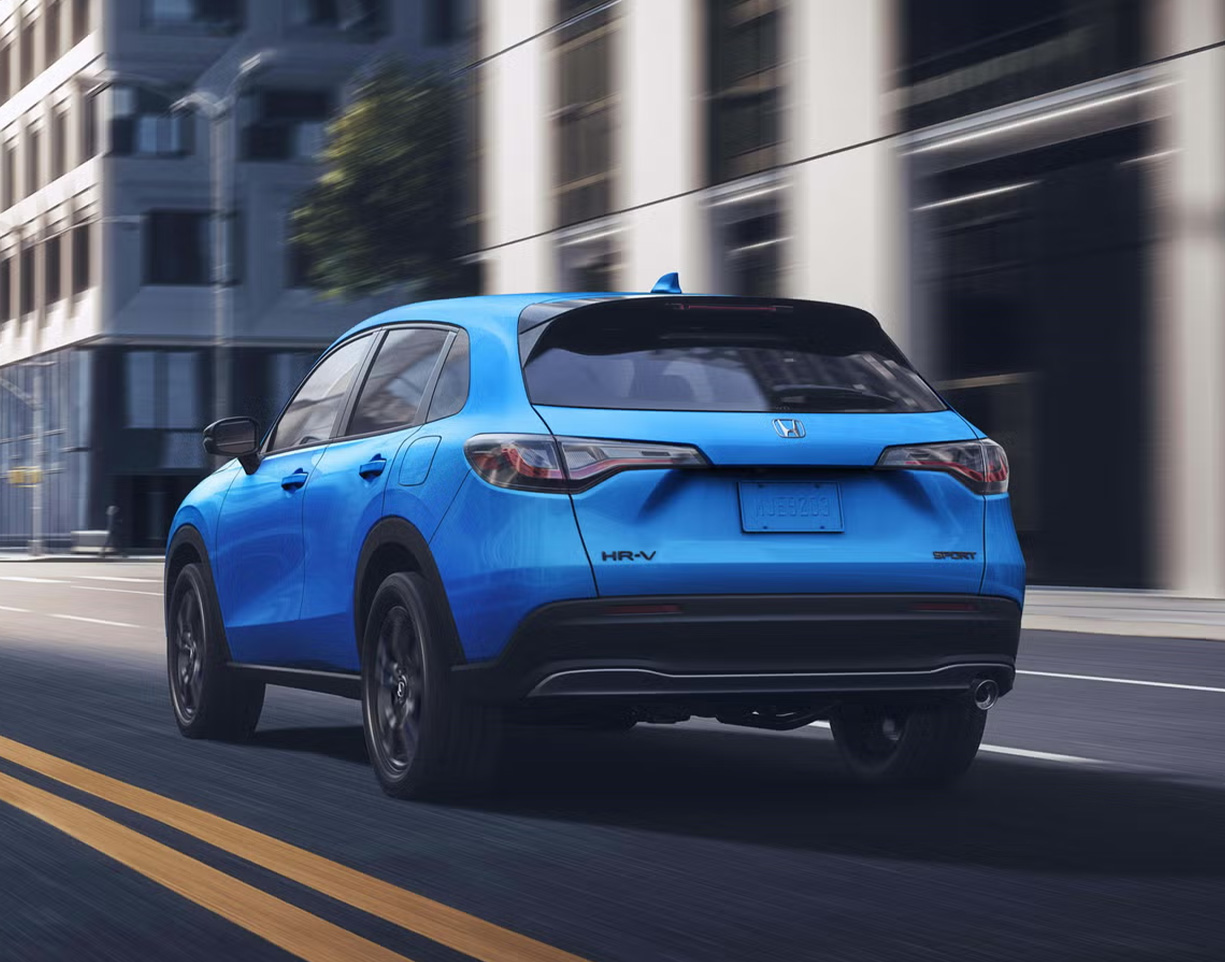 2026 Honda HR-V vs. 2026 Toyota Corolla Cross vs. 2026 Hyundai Kona comparison | Delaney Honda | Rear profile of a blue 2026 Honda HR-V 2026 Honda HR-V vs. 2026 Toyota Corolla Cross vs. 2026 Hyundai Kona comparison | Delaney Honda | Rear profile of a blue 2026 Honda HR-V