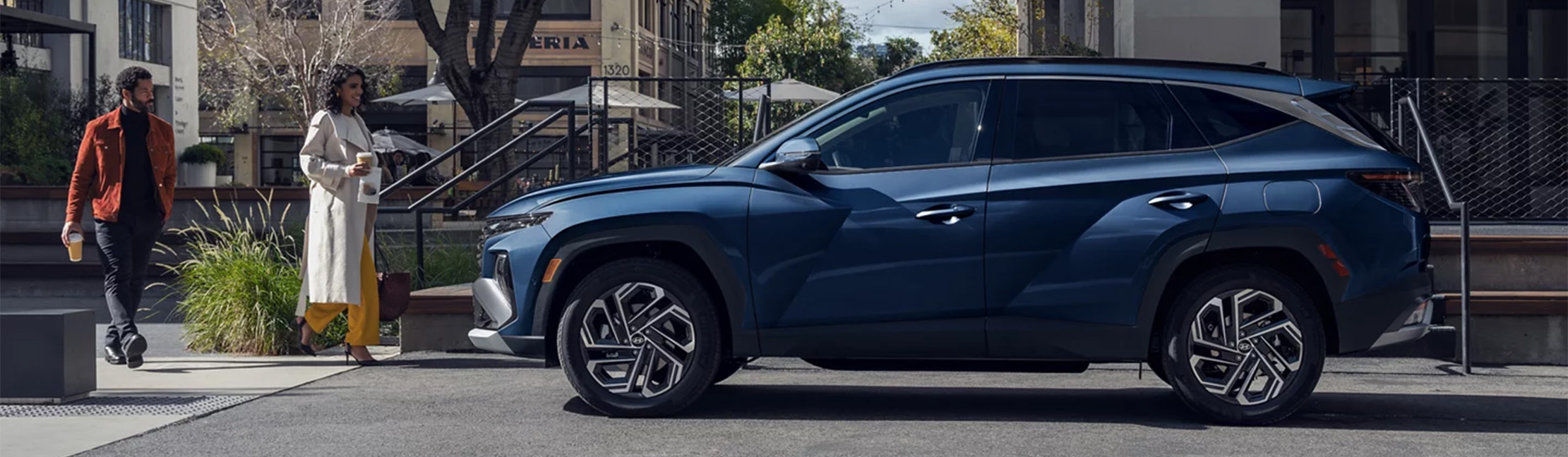 2026 Hyundai Tucson at Delaney Hyundai of Dubois | Side profile of a 2026 Hyundai Tucson parked on the street 2026 Hyundai Tucson at Delaney Hyundai of Dubois | Side profile of a 2026 Hyundai Tucson parked on the street