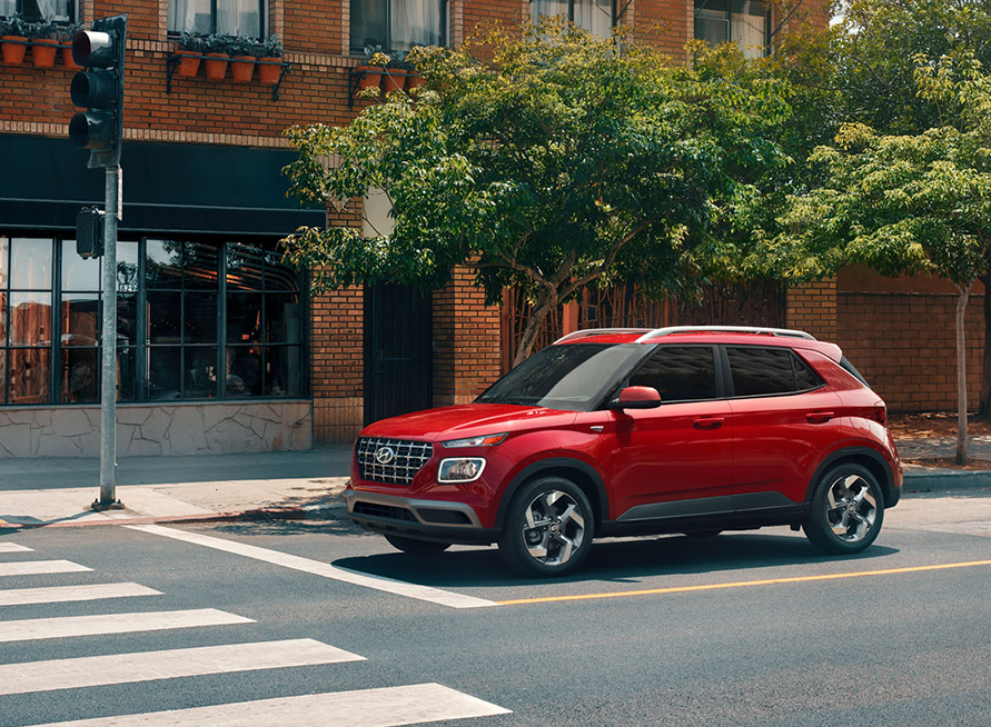 2026 Hyundai Venue at Delaney Hyundai of Indiana | Red 2026 Hyundai Venue at a stop light 2026 Hyundai Venue at Delaney Hyundai of Indiana | Red 2026 Hyundai Venue at a stop light