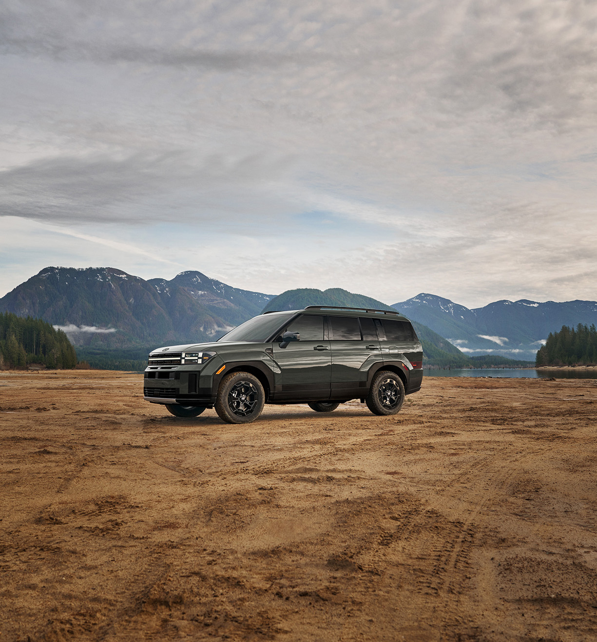 2026 Hyundai Santa Fe vs. 2026 Honda Pilot vs. 2026 Toyota Highlander comparison | Delaney Hyundai of Indiana in Indiana, PA | Green 2026 Hyundai Santa Fe parked outside with views of the mountains in the background 2026 Hyundai Santa Fe vs. 2026 Honda Pilot vs. 2026 Toyota Highlander comparison | Delaney Hyundai of Indiana in Indiana, PA | Green 2026 Hyundai Santa Fe parked outside with views of the mountains in the background