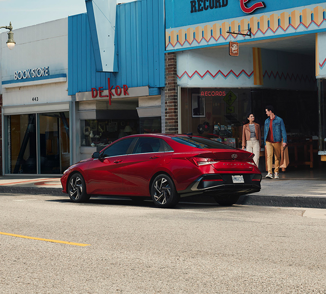 2026 Hyundai Elantra at Jack Giambalvo Hyundai | Rear profile of a 2026 Hyundai Elantra parked on the side of the road