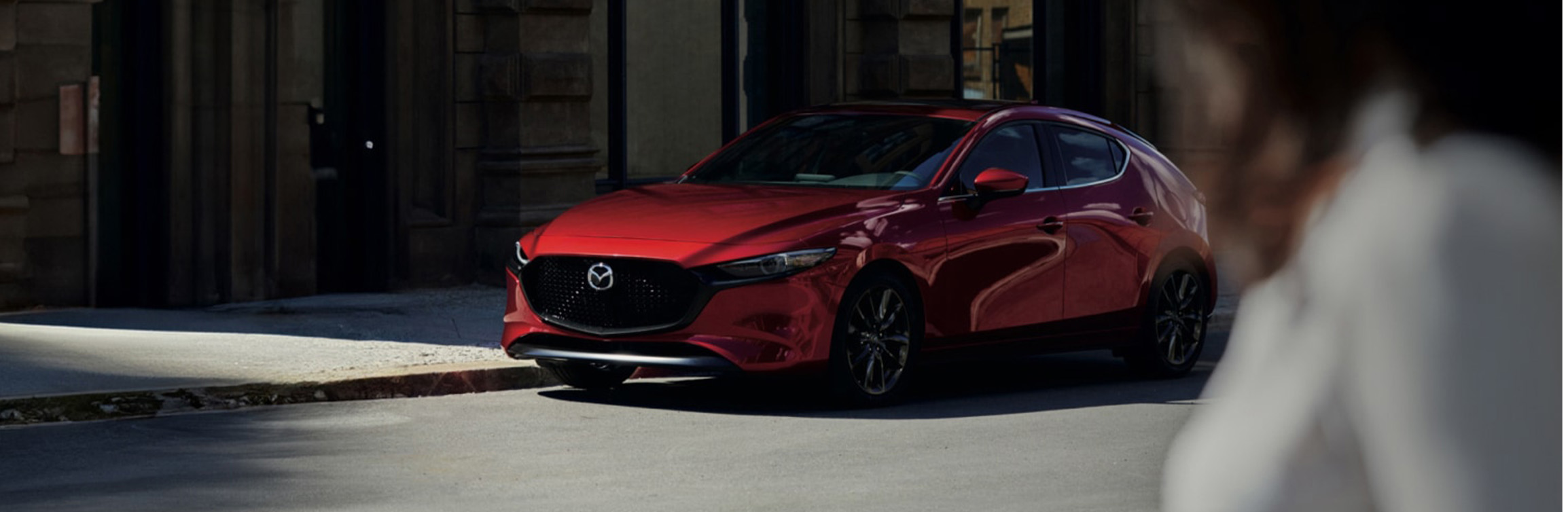 2026 Mazda3 Hatchback at Lancaster Mazda in East Petersburg, PA | Red 2026 Mazda 3 Hatchback parked on the side of the street 2026 Mazda3 Hatchback at Lancaster Mazda in East Petersburg, PA | Red 2026 Mazda 3 Hatchback parked on the side of the street