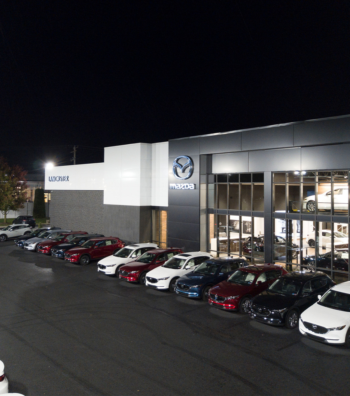 Why Buy From Us | Lancaster Mazda | Lancaster Mazda Dealership at night Why Buy From Us | Lancaster Mazda | Lancaster Mazda Dealership at night