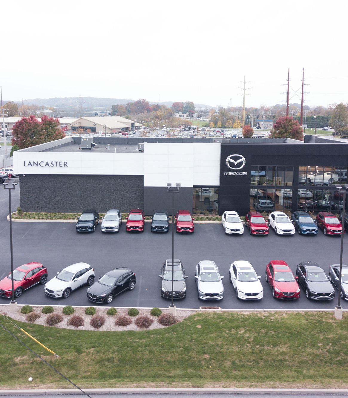 Why Buy From Us | Lancaster Mazda | Lancaster Mazda Dealership during the day Why Buy From Us | Lancaster Mazda | Lancaster Mazda Dealership during the day