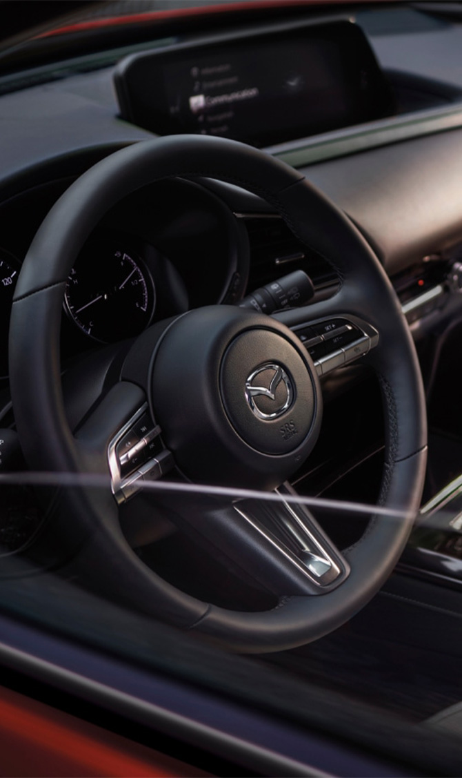 2026 Mazda CX-30 at Lancaster Mazda | Close up of the steering wheel of a 2026 Mazda CX-30 2026 Mazda CX-30 at Lancaster Mazda | Close up of the steering wheel of a 2026 Mazda CX-30