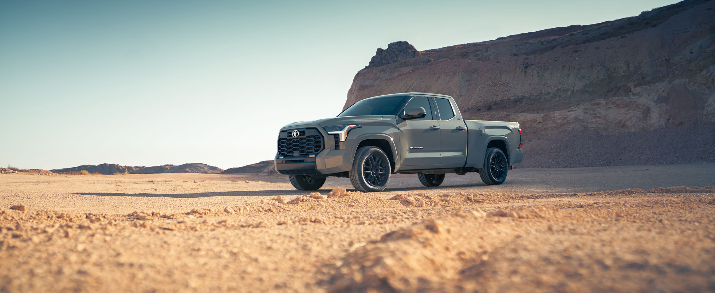 The New 2026 Toyota Tundra at Lancaster Toyota in East Petersburg, PA | Grey color 2026 Toyota Tundra parked on a dirt field The New 2026 Toyota Tundra at Lancaster Toyota in East Petersburg, PA | Grey color 2026 Toyota Tundra parked on a dirt field