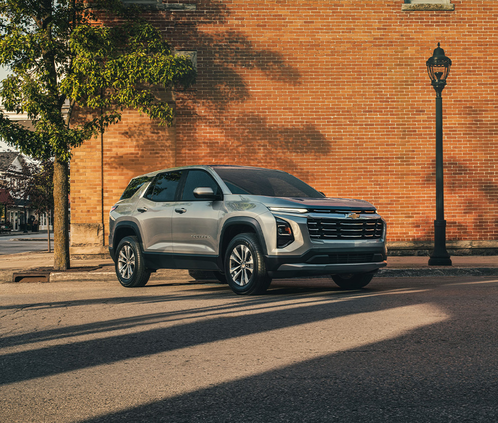 2026 Chevrolet Equinox at Sir Walter Chevrolet | Silver 2026 Chevrolet Equinox parked in front of a brick wall 2026 Chevrolet Equinox at Sir Walter Chevrolet | Silver 2026 Chevrolet Equinox parked in front of a brick wall