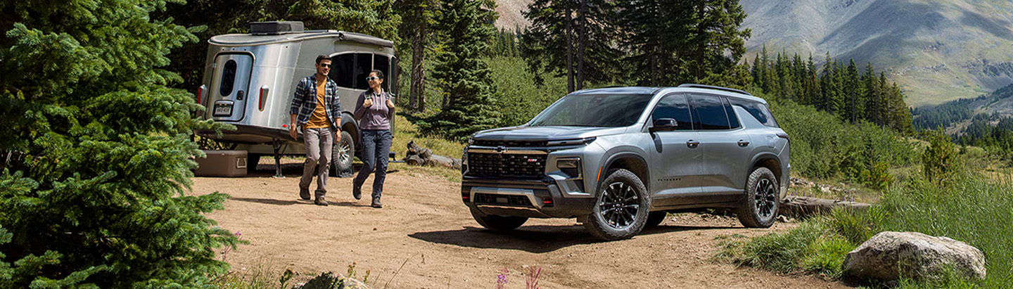 2026 Chevrolet Traverse at Sir Walter Chevrolet | Grey 2026 Chevrolet Traverse out in the woods
