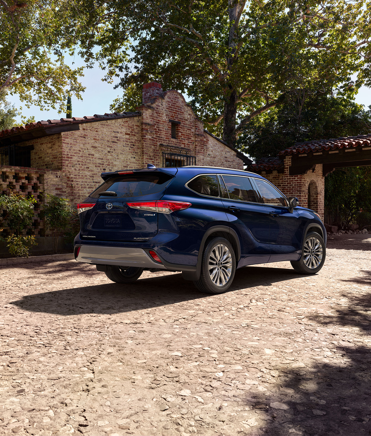 Rear profile of a blue 2026 Toyota Highlander