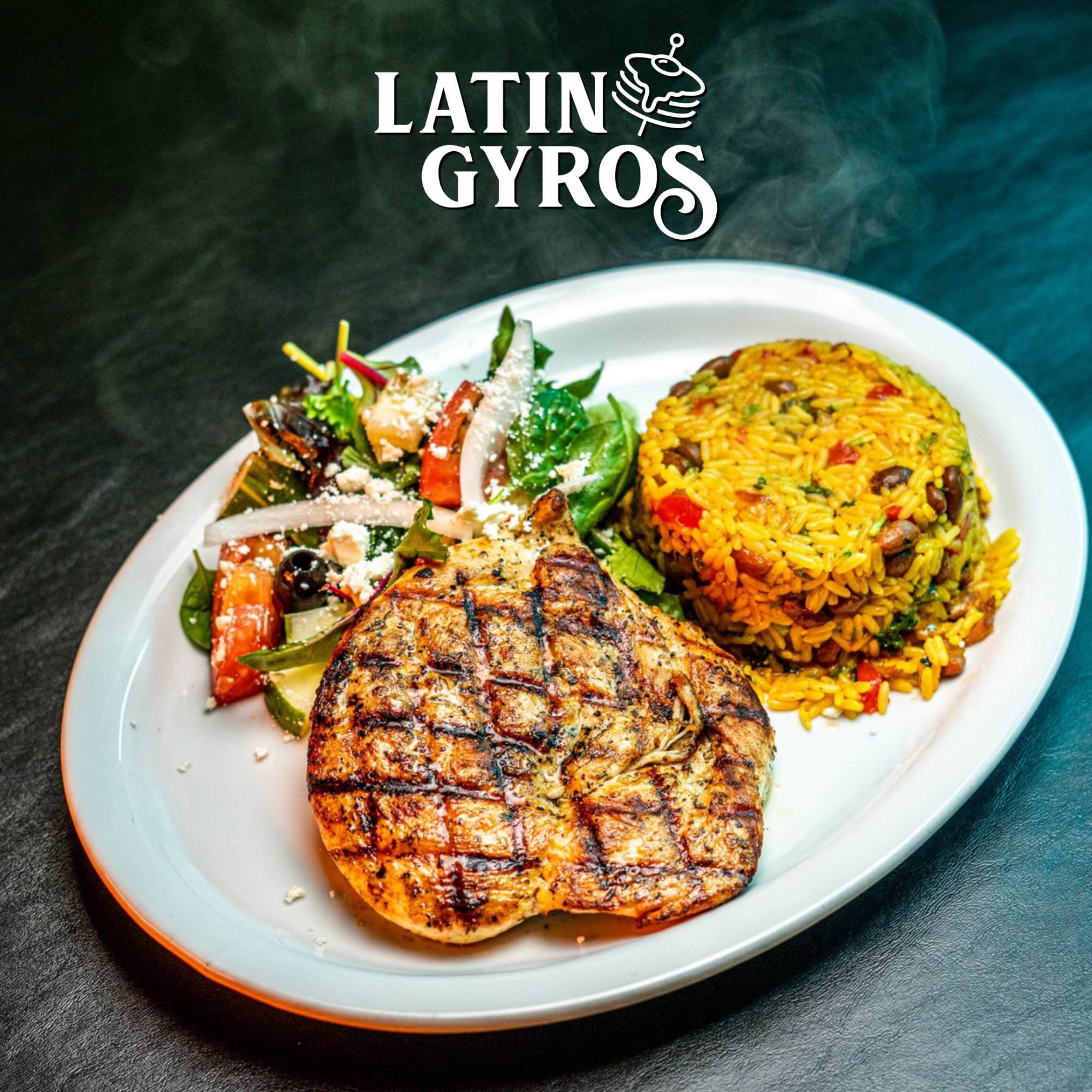 Signature main dish plated with house sides