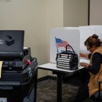 Special Report-Voting-system Firms Battle Right-wing Rage Against The Machines