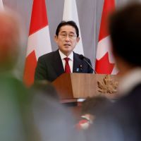 A menacing Russia and China pull Japan out of its past