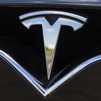 The Zacks Analyst Blog Highlights Tesla, TotalEnergies, Intuitive Surgical, Charles Schwab and Monster Beverage