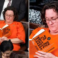 Katie Porter reads ‘The Subtle Art of Not Giving a F–k’ during…