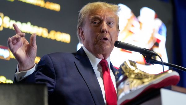 Trump sells golden trainers as he works out how to pay $355m fine